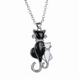 Cat Paw Black White 2 Cats On A Heart Crystal Necklace